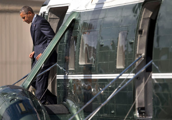 <p>President Barack Obama steps off Marine One upon his arrival at Roseburg Municipal Airport, Friday, Oct. 9, 2015 in Roseburg, Ore. Obama traveled to Roseburg, to meet with families of the victims of the Oct. 1, shooting at Umpqua Community College, as part of a four-day West Coast tour. Obama is also scheduled to attend a fundraiser event later today in Seattle with Sen. Patty Murray, D-Wash. He's is also attending fundraisers in San Francisco and Los Angeles during the four-day visit. </p>