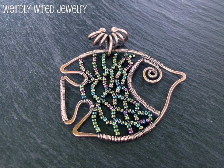 http://www.pinterest.com/pin/58828338857110115/ Wire and Bead Fish