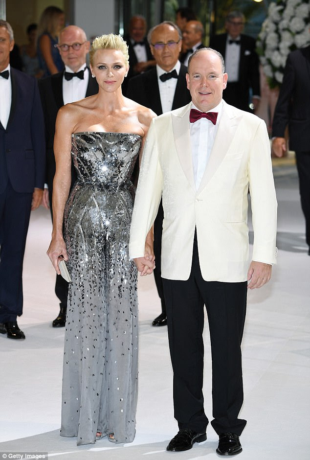 Silver stunner: Joining her at the bash was Charlene, Princess of Monaco and her husband Prince Albert II, with both the couple looking dashing in chic ensembles