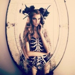 Garlands and bones in a shoot by @koty2 on Fashionising. | #fashion #model #mirror #skeleton #garland #flowers #headpiece #gothic #beauty #g...