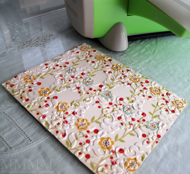 1) Pressure emboss a piece of patterned paper (or plain cardstock or stamped) in an embossing folder