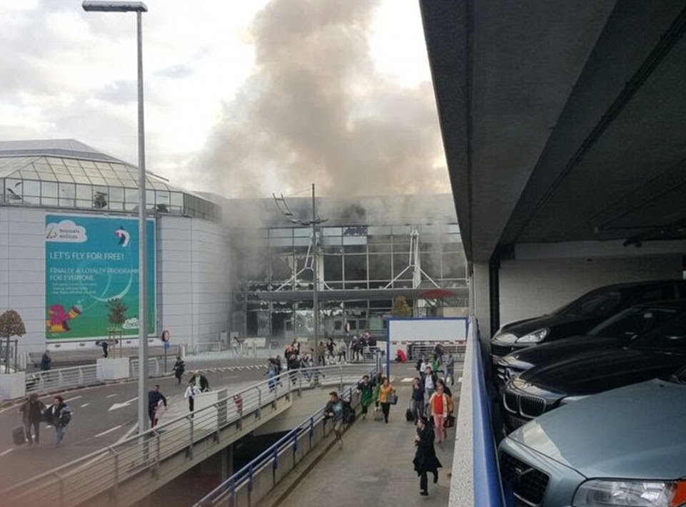 Shouts in Arabic were reportedly heard before the explosions which sent shockwaves through the terminal building, shattering windows