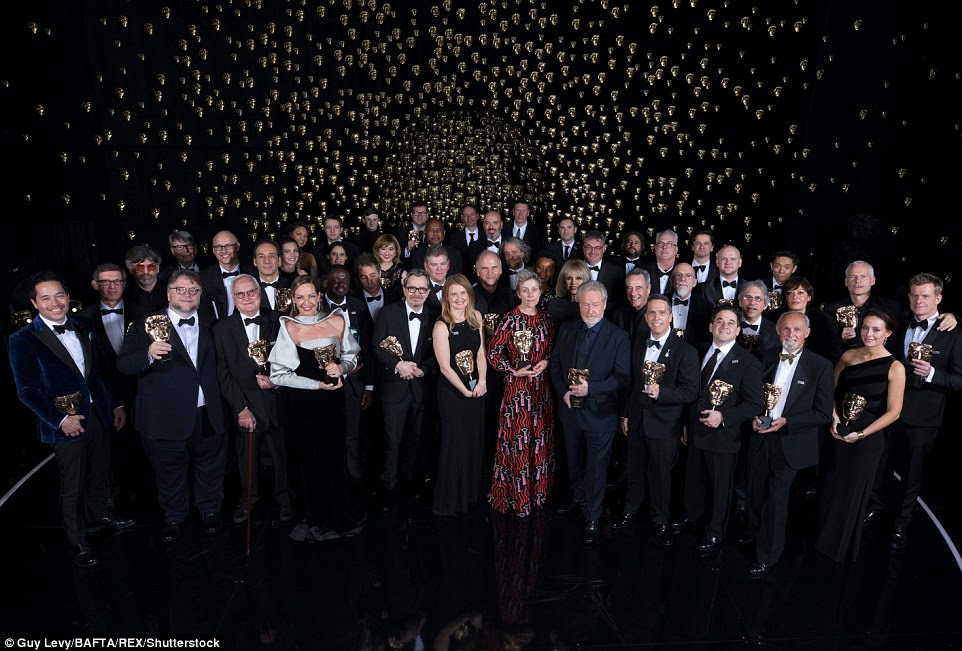 Night full of stars: The triumphant winners of the 71st British Academy Film Awards posed with their prizes at the end of the evening