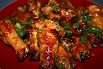 Sriracha grilled chicken wings that melt in your mouth