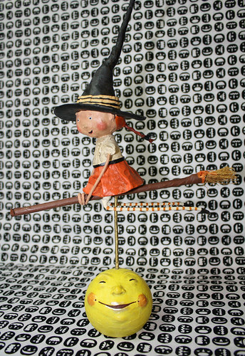 Witch flying over the moon