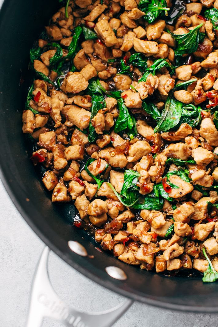 Garlic Lovers Thai Basil Chicken - Learn how to make authentic, restaurant-style basil chicken at home! A quick recipe that won't take you long at all! #thaibasilchicken #basilchicken #thaifood #basilchickenstirfry #chickenstirfry | Littlespicejar.com