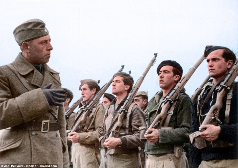 Germany was one of the first foreign powers to involve itself in the conflict as Hitler spotted a potential ally in the Nationalists and sent troops and weapons to reinforce them. Here, a German commander gives instructions to troop from the Condor Legion, which was made up of volunteers from the Luftwaffe and German Army