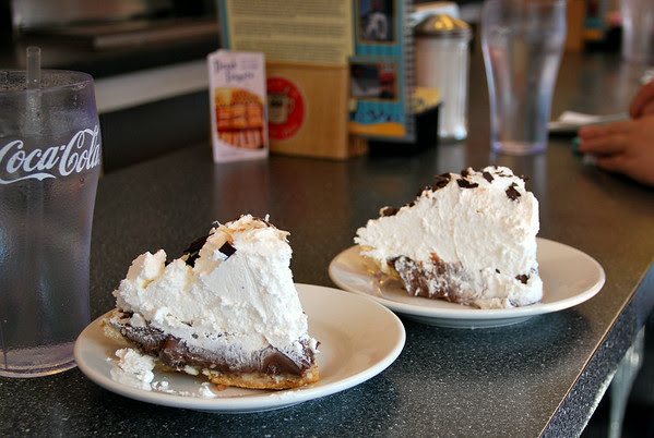 To the left - cocoa-nut cream pie; to the right - chocolate cream pie.