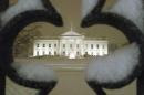 A view of the White House as snow begins to fall during expected blizzard in Washington DC