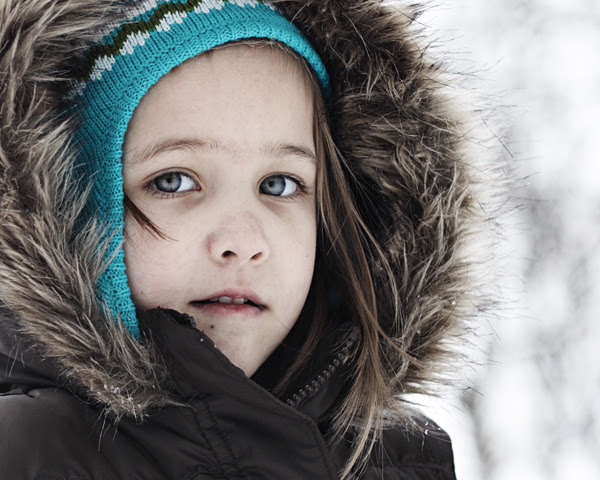 she wears winter well.