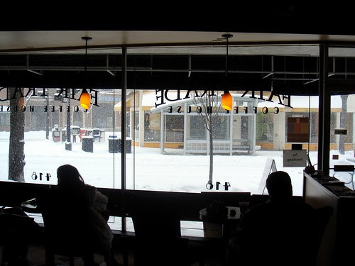 Looking at the snow through the café window