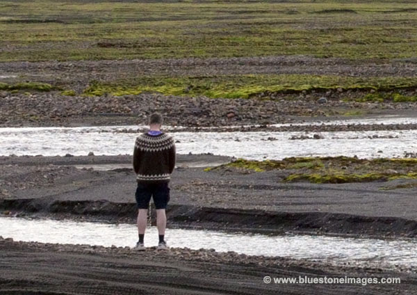 06D-0713a Temp Bloke Pissing in the Stream Next to the Hut Iceland