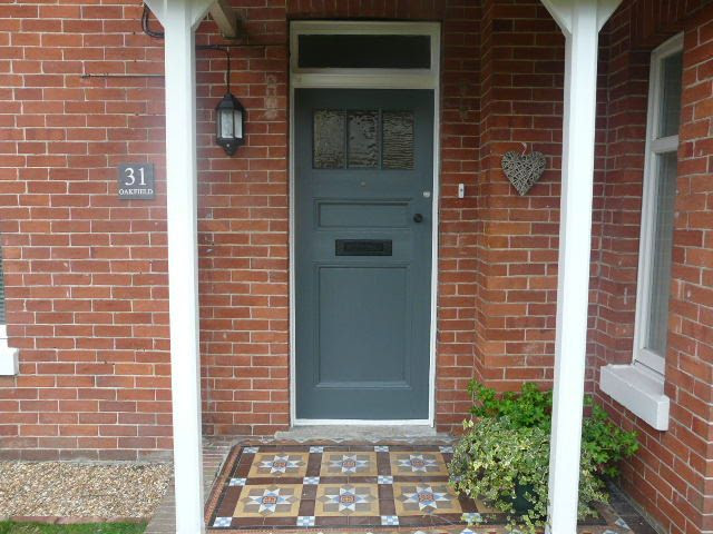 Front door in Farrow and Ball Down Pipe