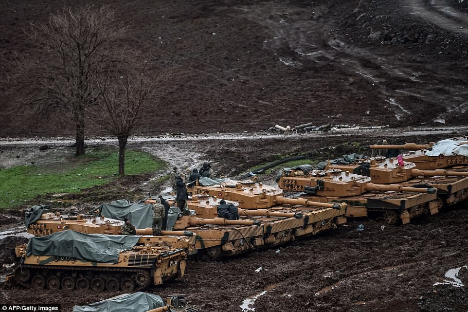 The 1970s-built armoured vehicles have been shown up to be vulnerable in combat after having been deployed to kill Kurdish fighters, who are backed by Britain and the US. They are pictured here with Turkish soldiers standing on them stationed in a field near the Syrian border at Hassa, in Hatay province on January 25, 2018, as part of the operation "Olive Branch", launched on January 20