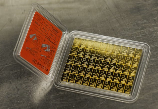 A gold Combibar is seen at a plant of gold refiner and bar manufacturer Valcambi SA in the southern Swiss town of Balerna
