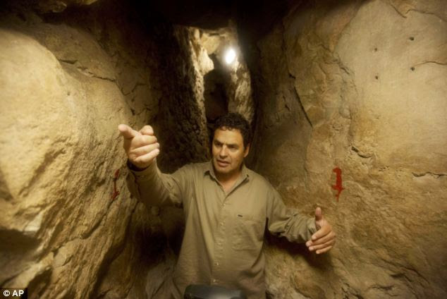 Eli Shukron, an archeologist formerly with Israel's Antiquities Authority, walks in the City of David archaeological site near Jerusalem's Old City. Shukron says this is the legendary citadel captured by King David in his conquest of Jerusalem.