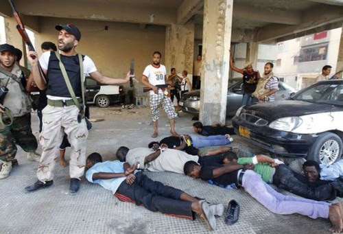 Africans in US-NATO occupied Libya have been arrested, beaten, tortured and killed by the CIA, MI-6 trained counter-revolutionary rebels. The armed groups have targeted dark-skinned people for liquidation. by Pan-African News Wire File Photos