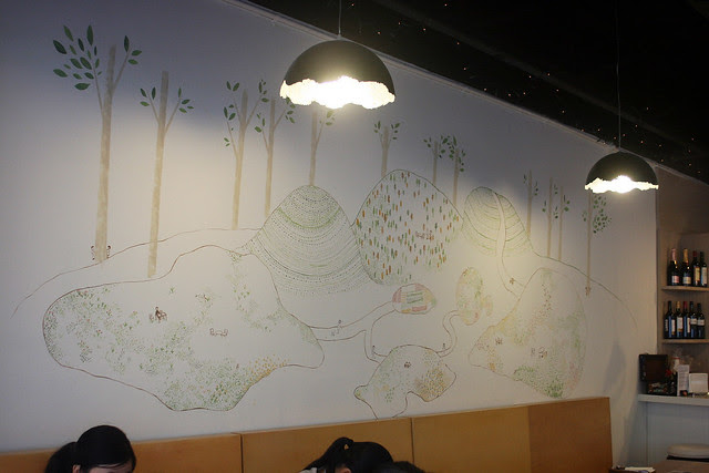 Three young artists hand-painted the mural over two nights