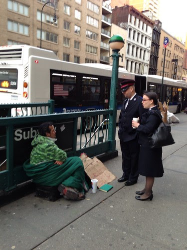 Salvation Army workers with homeless man