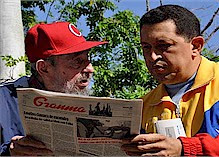 Former Republic of Cuba President Fidel Castro and Venezuelan President Hugo Chavez reading Granma newspaper in Havana. Chavez is in Cuba for medical treatment. The revolutionary leaders exchange views on many topics. by Pan-African News Wire File Photos
