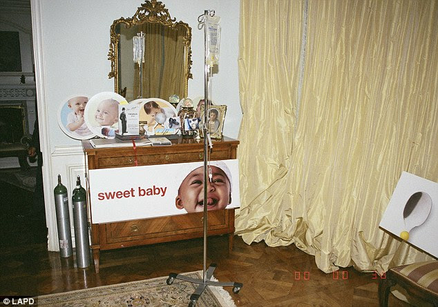 Unseen: New evidence pictures of Jackson's bedroom were released this week including this shot of an IV bag, oxygen canisters and a bizarre series of baby portraits