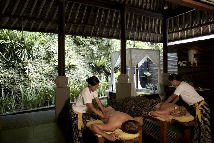 The resort's spa areas are open to the river and jungle below with an outdoor massage and relaxation area.