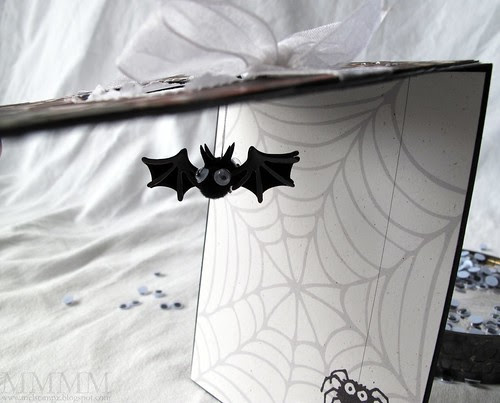 dangling bat inside window card