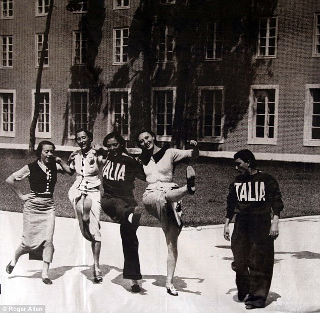 High-kicking: Athletes in high spirits outside the Village before the 1936 Games