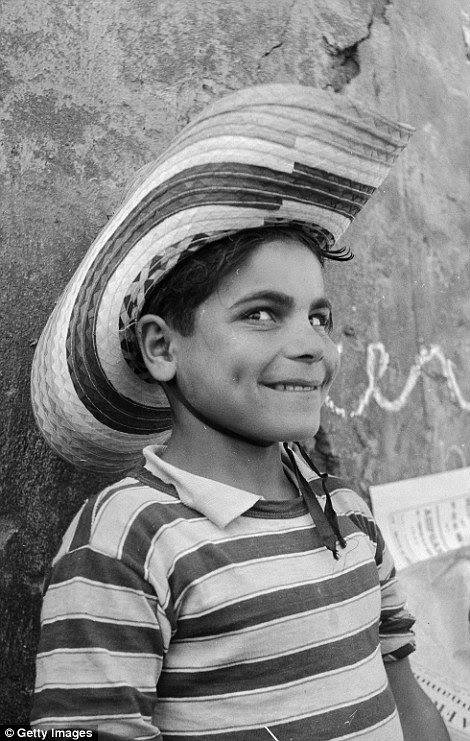 A cheeky young boy  from Calabria, southern Italy