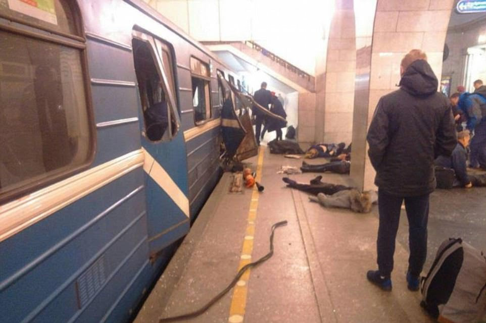 Bodies lie strewn across the platform and the doors are blown open after the two blasts on the Russian metro network