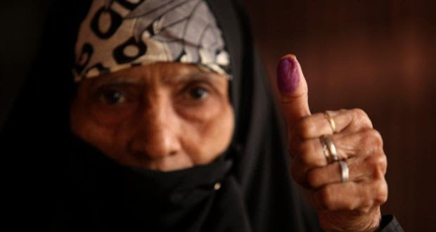  A woman shows her finger colored with ink after casting her vote at a centre in the tenth national elections in Dhaka, Bangladesh, today. Photograph: EPA 