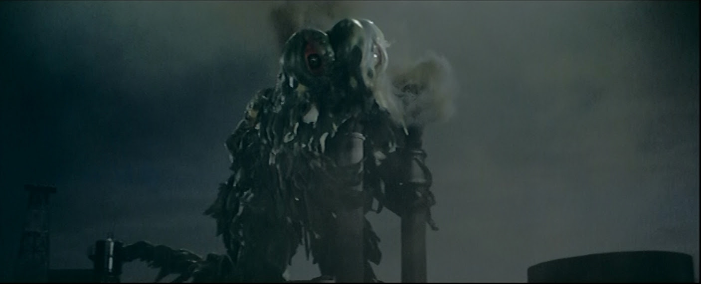 Hedorah take a hit of Ol' factory Smog.