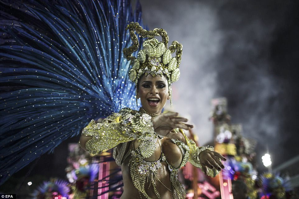 Spectacular: A dancer from the Grupo Especial Paraiso de Tuiuti samba school parades through the stadium in a glittering outfit