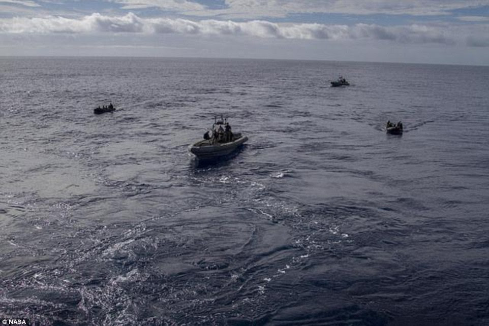 On hand: US Navy ships were waiting to retrieve Orion and return it to land after its 4.5 hour journey twice around Earth