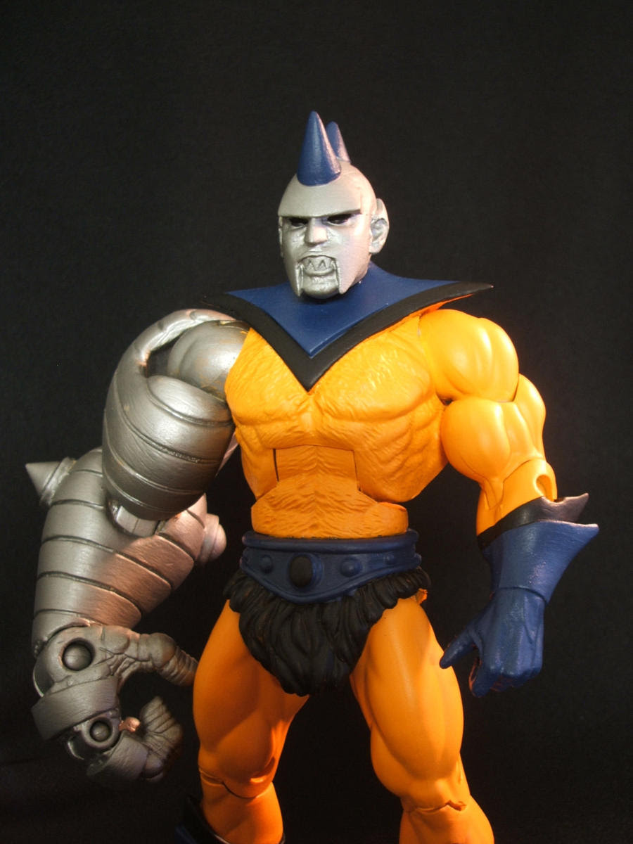 http://fc08.deviantart.net/fs70/i/2010/122/7/f/MOTUC_custom_Strongarm_V2_3_by_masterenglish.jpg