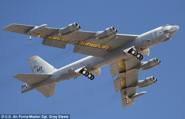 The Boeing-manufactured bomber (pictured) has been in use since 1952 and is expected to remain operating until 2040, when it'll be replaced by the Northrop Grumman's B-21. Air Force bosses are experimenting with fitting external laser pods to the giant plane, allowing it to blast incoming missiles out of the sky or jam their navigation systems.