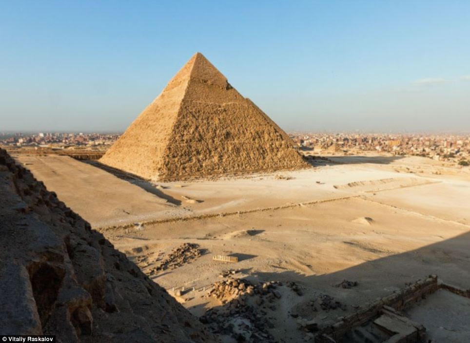 Ancient: Egyptian authorities put a stop to visitors climbing the pyramids in the 1980s, but it is thought some guides have been known to accept bribes to take tourists part of the way up