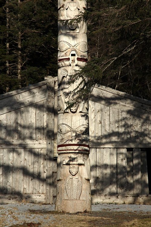 shadows on front of Chief Son-i-Hat Whale House and totem, Kasaan, Alaska