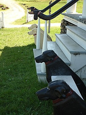handrail and benches in front of the gallery/shop