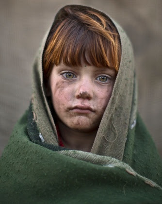 laiba Hazrat, six, a refugee from Afghanistan living in slum in Islamabad