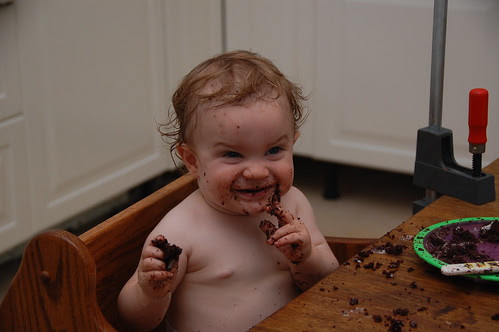 baby eating Chocolate Caramel Seduction Cupcakes