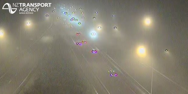 Motorists were warned to take care as fog blanketed the motorway this morning. Photo / NZTA