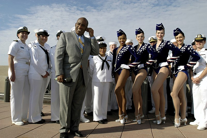 US Navy 060525-N-9640H-004 Television personality and weatherman Al Roker interviews the famous Radio City Rockettes and Sailors assigned to several ships participating in 2006 Fleet Week New York festivities