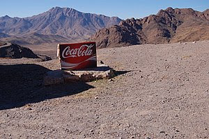 English: Sign “ Coca-Cola ” in the mountains o...