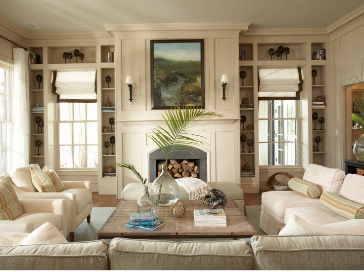 Pretty living room all in neutral. Love the shelving design on each side of the windows. Great use of space and way to display treasured items.    My Sweet Savannah