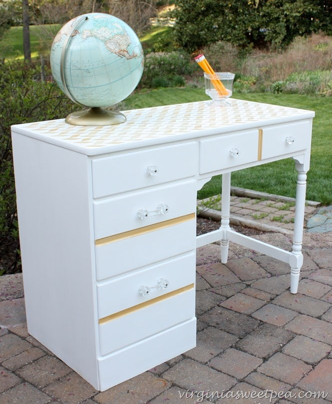 Desk Makeover - A desk gets a feminine makeover with white and gold paint and glass knobs.  virginiasweetpea.com