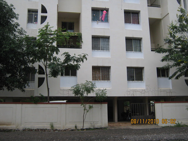 Pinnacle Cottage Close at 'Abhiruchi Village' on Sinhagad Road Pune 411 041 - Rawat Brothers' Radhanagari Phase 1 shares common compound wall