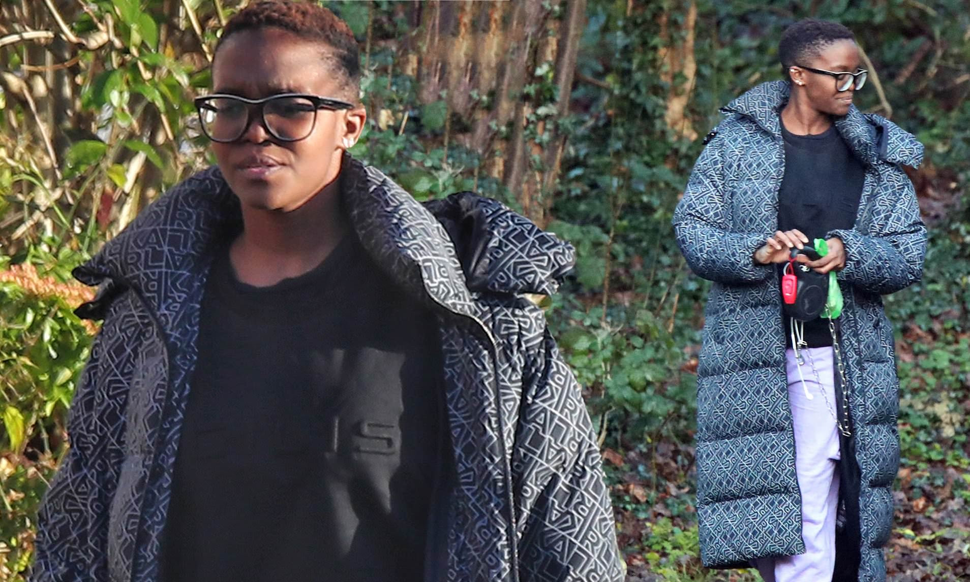 Oti Mabuse keeps things casual in a black padded jacket as she takes her dog Leo for a walk