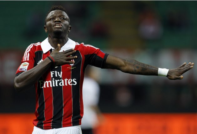 AC Milan's Muntari celebrates after scoring against Atalanta during their Italian Serie A soccer match in Milan