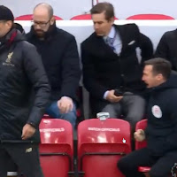 Liverpool winner celebrated by mystery man wearing Premier League officials’ jacket in dugout